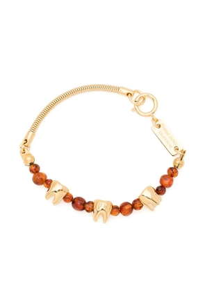 IN GOLD WE TRUST PARIS Sacred Tooth necklace - Brown