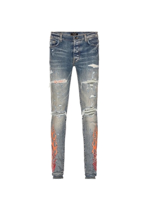 AMIRI flame-print ripped jeans - Blue