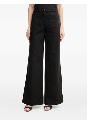 LUISA SPAGNOLI logo-appliqué jeans - Black