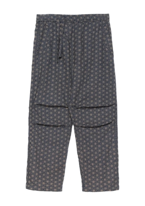 Maharishi geometric-pattern track pants - Blue