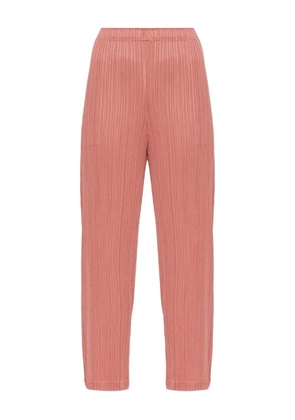 Pleats Please Issey Miyake pleated seam-pocket trousers - Pink