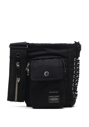 Toga appliqué-detail messenger bag - Black