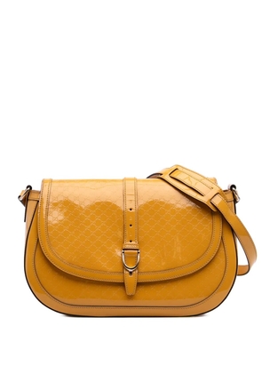 Gucci Pre-Owned 2016-2025 Microguccissima Patent Stirrup crossbody bag - Yellow