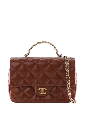 CHANEL Pre-Owned 2021-2025 Medium Quilted Shiny Lambskin Golden Links Top Handle Flap satchel - Brown