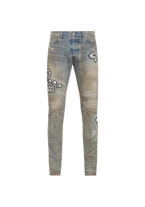 AMIRI applique skinny jeans - Blue