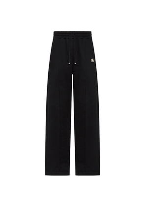AMIRI logo-applique drawstring track pants - Black