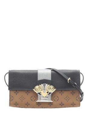 Louis Vuitton Pre-Owned 2017 Monogram Reverse Column clutch bag - Brown