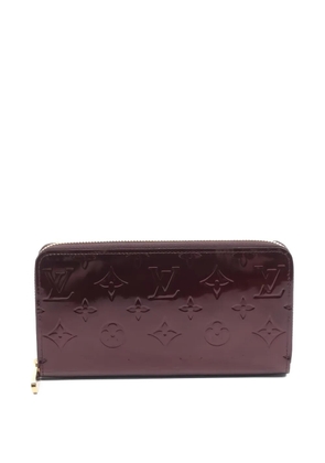 Louis Vuitton Pre-Owned 2010s monogram embossed wallet - Red