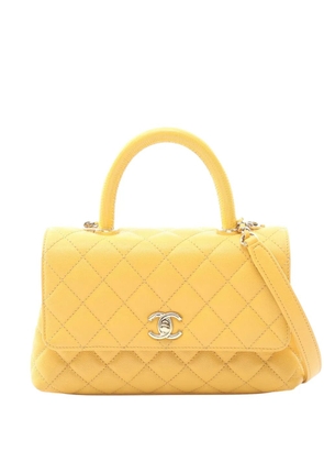 CHANEL Pre-Owned 2021-2026 Small Quilted Caviar Coco Handle Flap satchel - Yellow