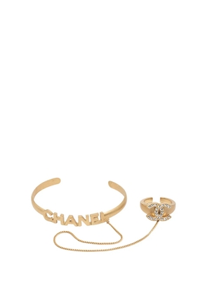 CHANEL Pre-Owned 2001 CC Gold Plated Rhinestone Logo Cuff Bracelet and Ring Set costume bracelet