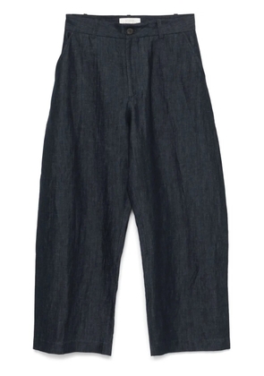 Studio Nicholson curved-leg trousers - Blue