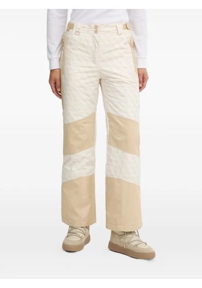 GUESS USA logo-pattern ski trousers - Neutrals
