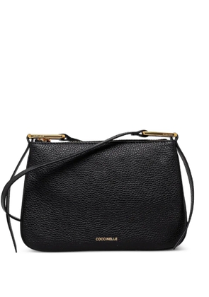 Coccinelle small Magie textured leather cross body bag - Black