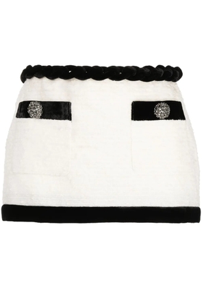 AREA button-embellished miniskirt - White