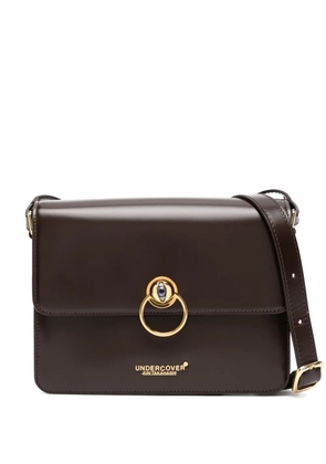 Undercover eyebuckeld cross body bag - Brown