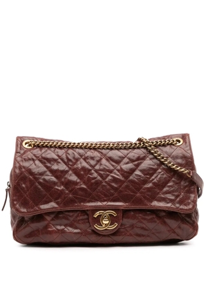 CHANEL Pre-Owned 2012 Large Quilted Glazed Caviar Shiva Flap crossbody bag - Red