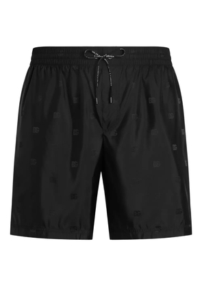 Dolce & Gabbana logo-pattern swim shorts - Black