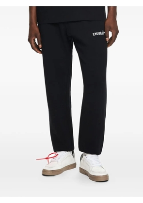 Off-White heraldic arrow cuffed track pants