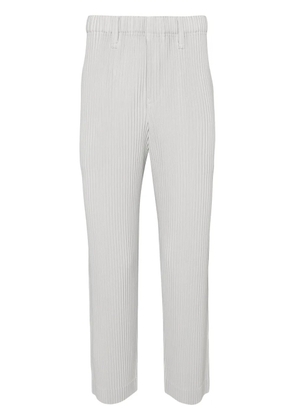 Homme Plissé Issey Miyake Basic tapered plissé trousers - Grey