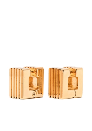 KHAITE small Empire engraved logo earrings - Gold