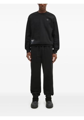 This Is Never That elasticated-ankle track pants - Black