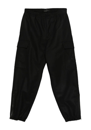 Stone Island cargo zipped-ankle trousers - Black