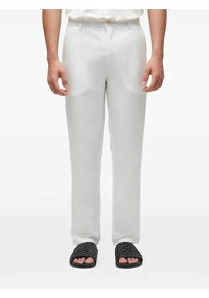 Osklen button-fastening trousers - White