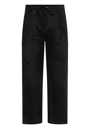 AMIRI distressed finish straight-legged jogging trousers - Black