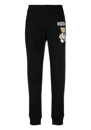 Moschino Teddy Bear-print tapered track pants - Black