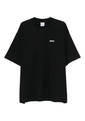 VETEMENTS lettering-print T-shirt - Black
