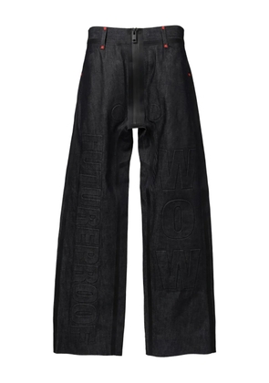 Walter Van Beirendonck logo-print jeans - Blue