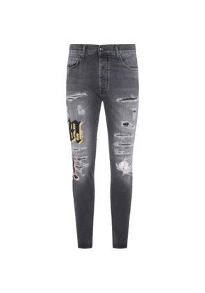 AMIRI ripped patch skinny jeans - Grey
