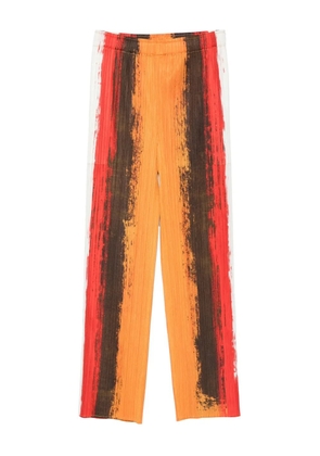 Pleats Please Issey Miyake pleated stripe trousers - Red