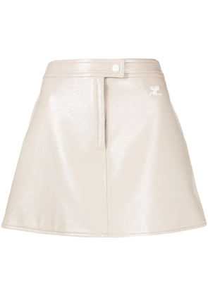 Courrèges logo-appliqué high-waisted mini skirt - Neutrals