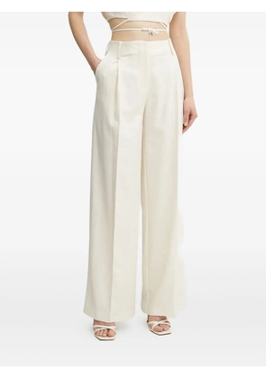 SIMONA CORSELLINI front-pleated trousers - White