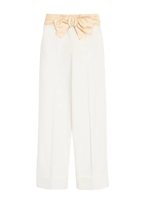 Valentino Garavani bow-detail trousers - Neutrals