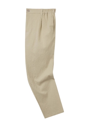 Howlin' textured stretch-cotton trousers - Neutrals