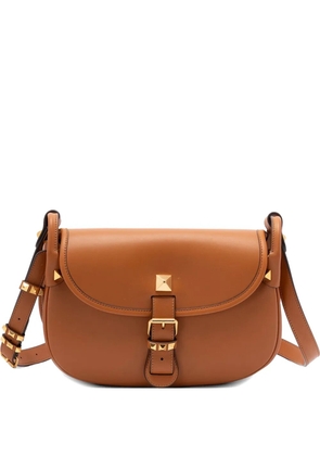 Valentino Garavani Flaneuse studded buckle-strap leather shoulder bag - Brown