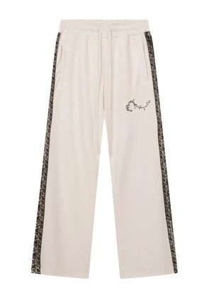 ROUGH. lace-insert side-stripe track pants - White