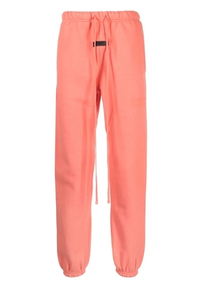 FEAR OF GOD ESSENTIALS Essentials logo-patch track pants - Pink