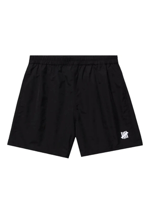 Undefeated logo-plaque swim shorts - Black