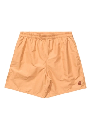 Undefeated logo-embroidered swim shorts - Brown