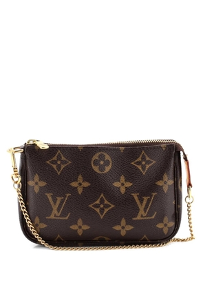 Louis Vuitton Pre-Owned Pochette Accessoires Monogram Canvas Mini clutch bag - Brown