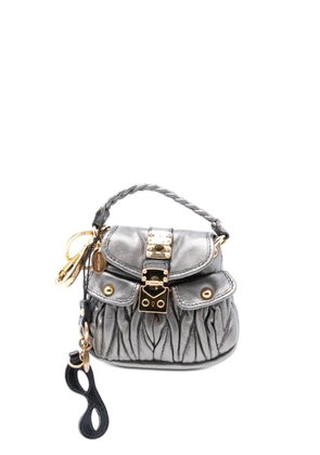 Miu Miu Pre-Owned 2000-2025 Mini Metallic Matelasse Lambskin Coffer Bag Charm key holder - Silver