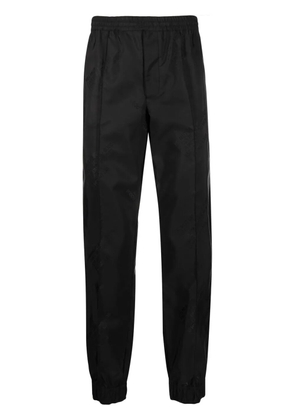 Helmut Lang logo-print tapered trousers - Black