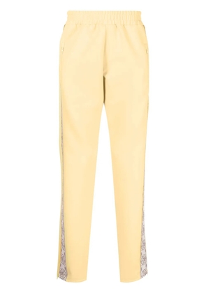 MOUTY logo-print track pants - Yellow
