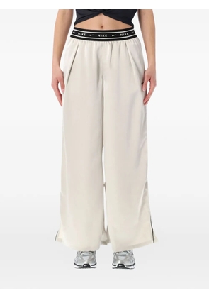 Nike logo-embroidered trousers - Neutrals