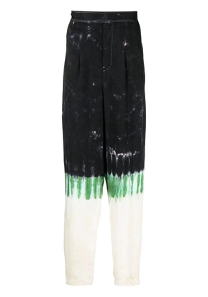 Toga Virilis tie-dye print straight-leg trousers - Black
