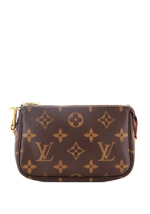 Louis Vuitton Pre-Owned Pochette Accessoires Monogram Canvas Mini clutch bag - Brown