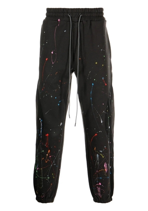 Mostly Heard Rarely Seen paint-splattered tapered joggers - Black